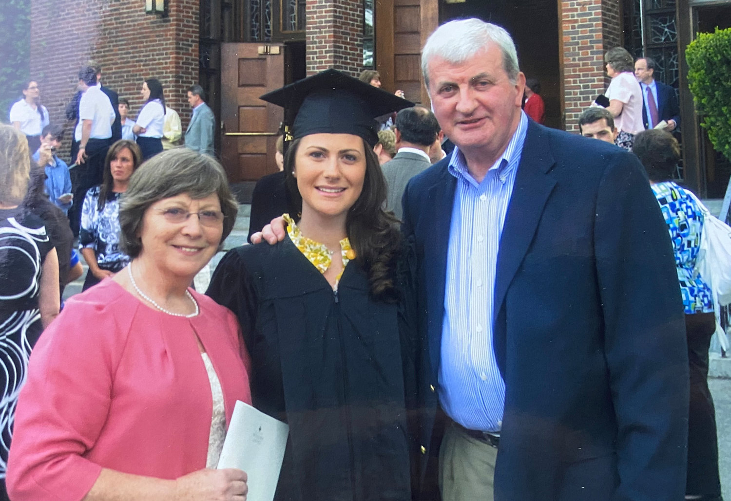 Michael Dunphy, far right, along with his wife, Geraldine, and daughter, Una, at Una’s graduation from St. Anselm College in New Hampshire. Dunphy called sending his children to college, “Simply the American dream.”