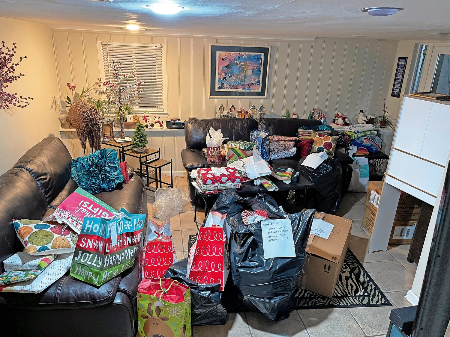 Gail Mancuso’s living room was filled with some of the many gifts collected.