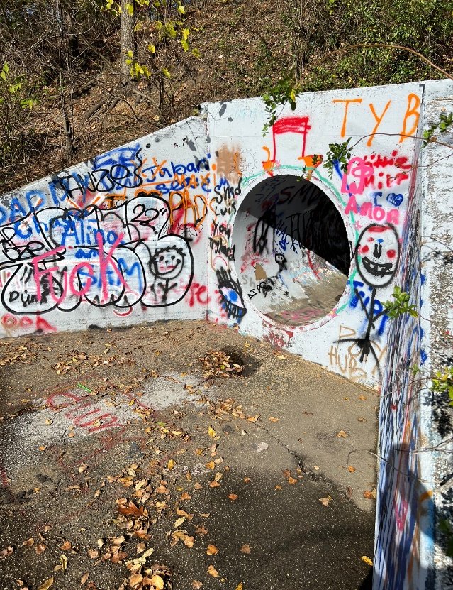Graffiti can be seen throughout the area. Every time it is painted over, it reappears.