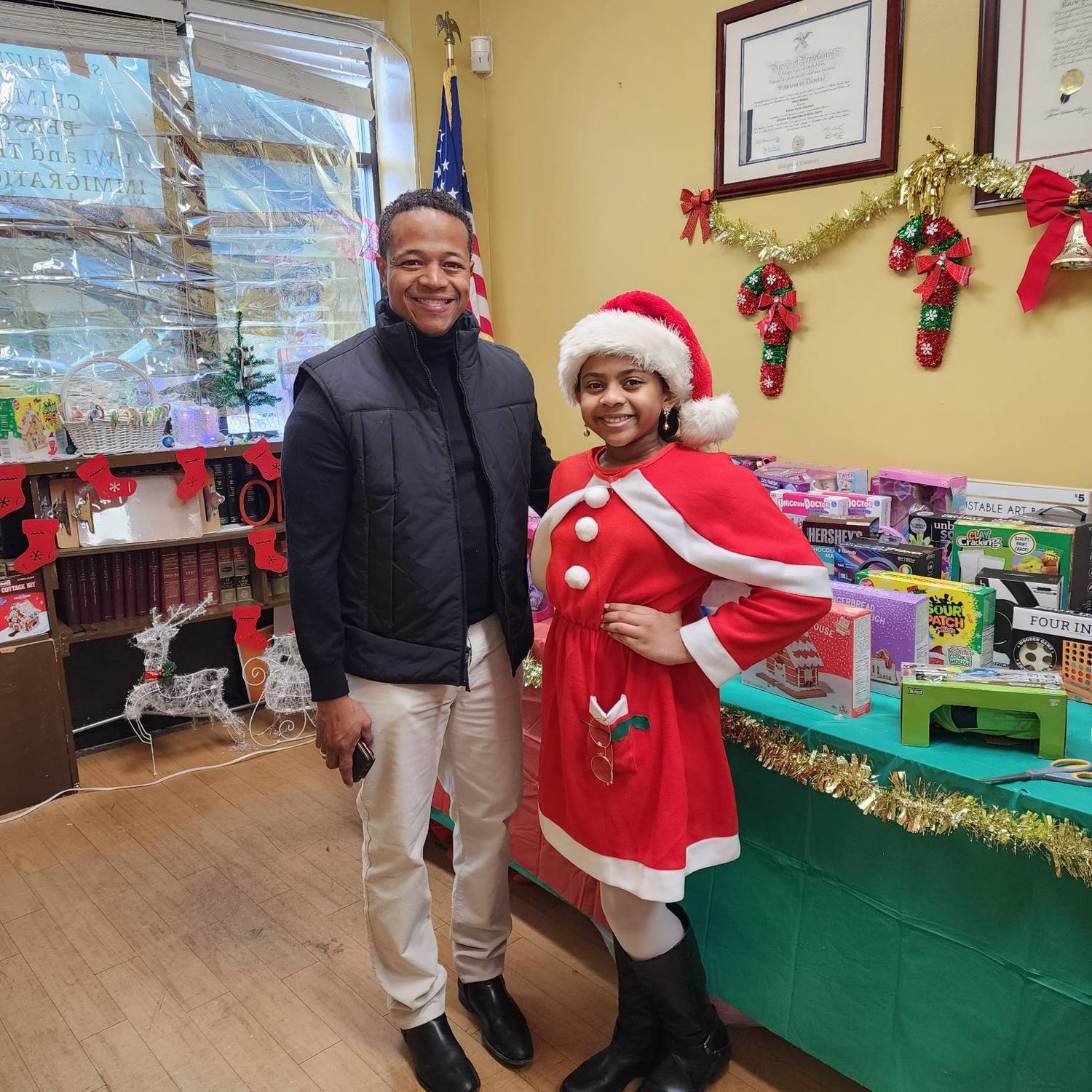 Nassau county Legislator Carrié Solages and Selene Ferdinand handed out holiday gifts to children in Elmont on Dec. 10.