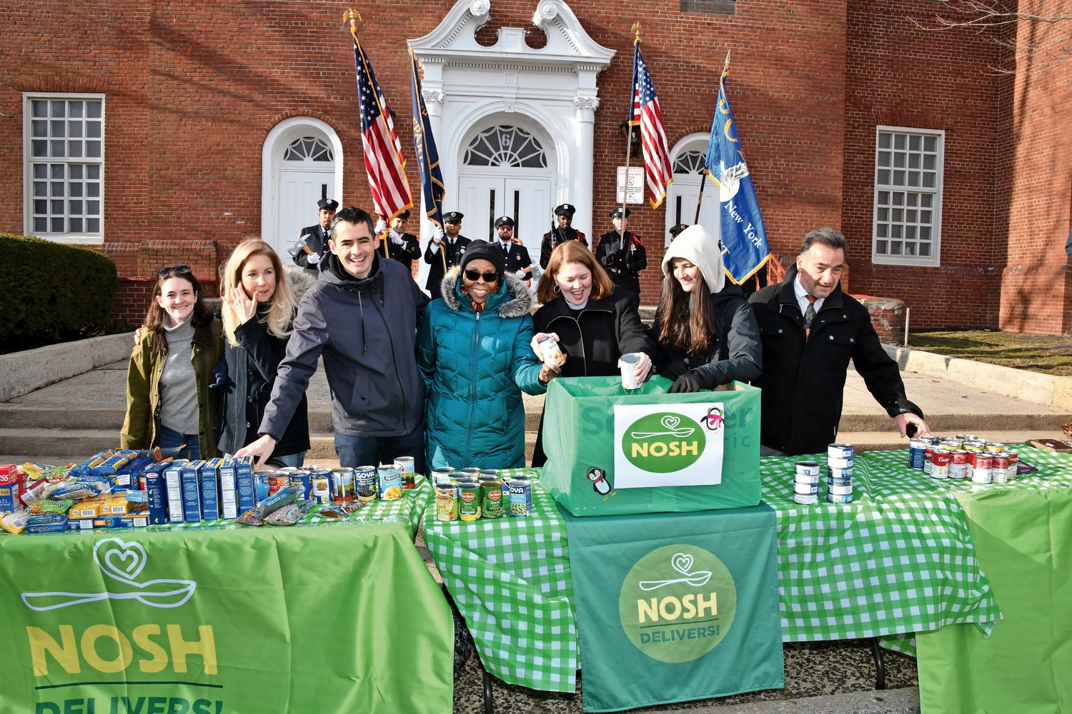 NOSH had a table at the entrance to the middle school to collect food for those in need. Martin Luther King Jr. Day is the only federal holiday designated as a National Day of Service to encourage Americans to volunteer in their communities.