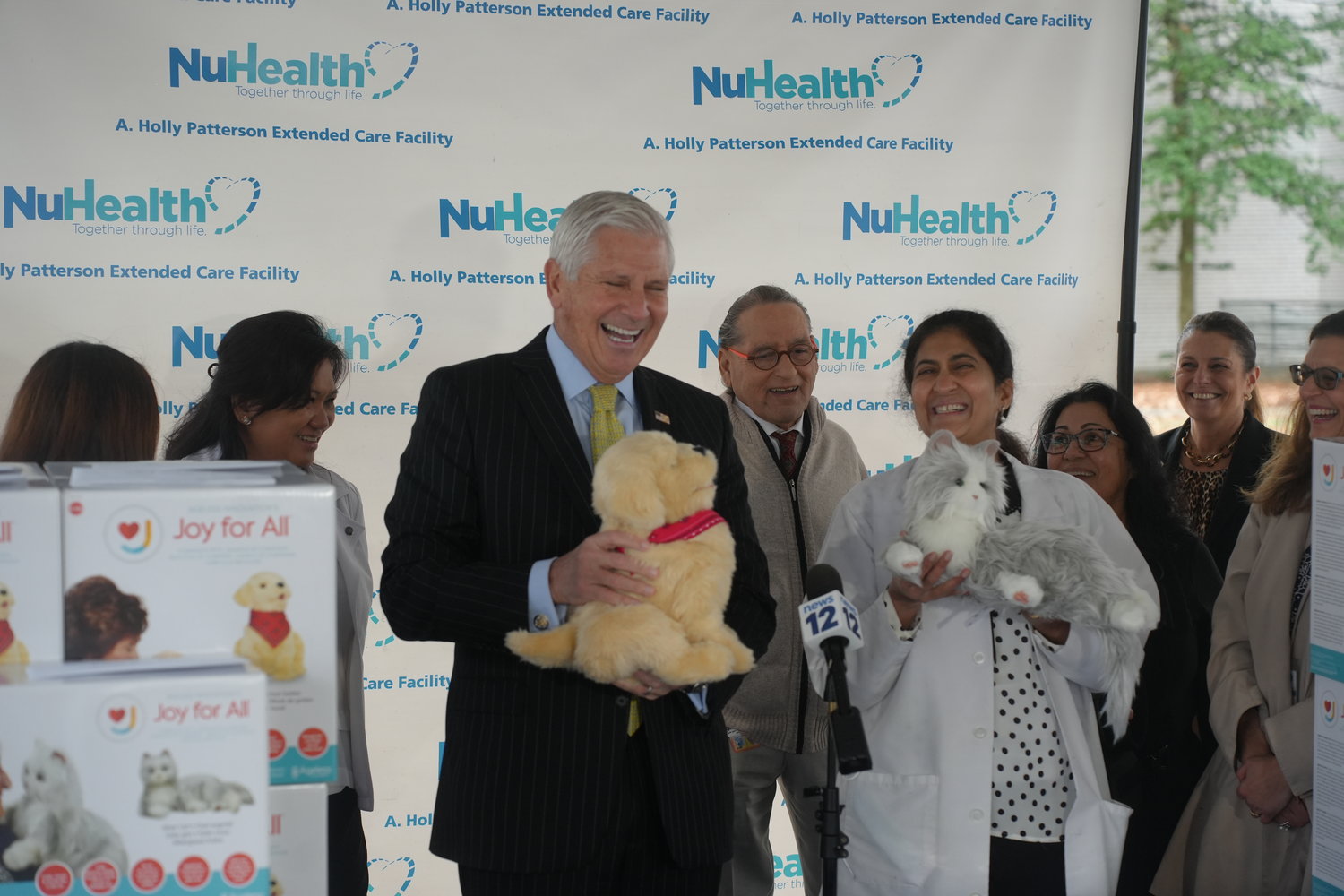 County Exec. Bruce Blakeman spoke about the animatronic pets that the seniors at the A. Holly Patterson Care Facility in Uniondale received rom the state department of aging