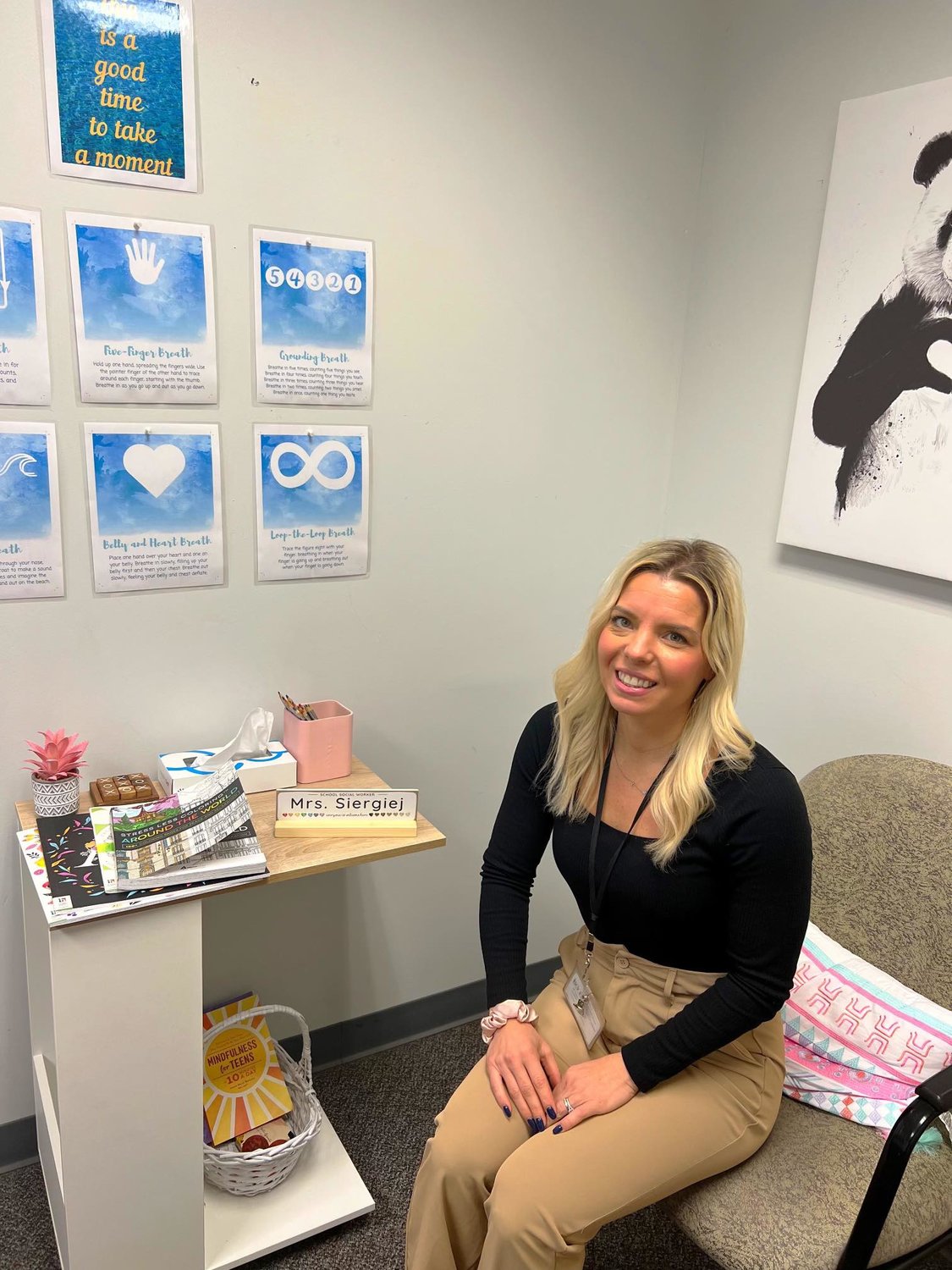 Colby Siergiej sits in her Nassau BOCES Barry Tech office. She is one of two social workers assisting students in their junior and senior year in navigating the world around them through various coping skills and outlets.
