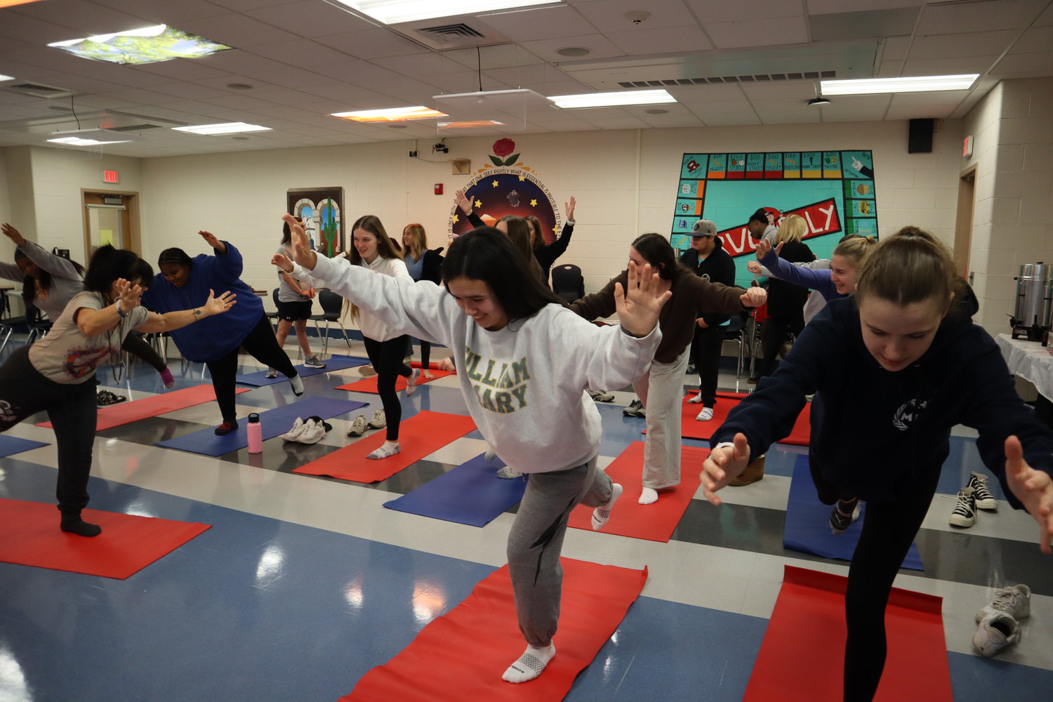 South Side High School students assume the warrior pose during a morning yoga lesson led by instructor Maryann Vogel.