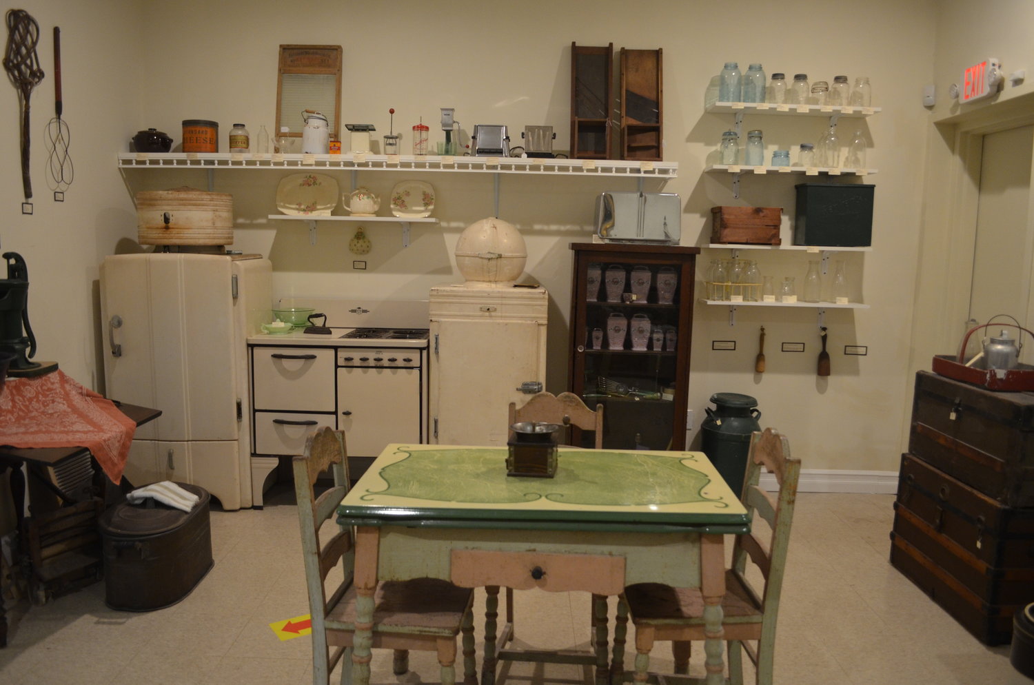 A replica of a 1900s kitchen display inside the Franklin Square Museum.