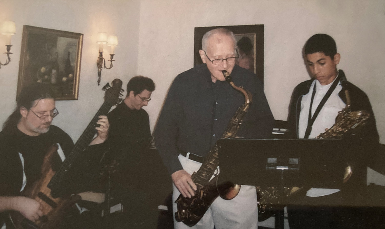 In 2011, Alan, left, and Jonathan, Bill Katz’s sons, played with their father and Alan’s son, Benjamin. It was Gloria Katz, Bill's wife's, 80th birthday