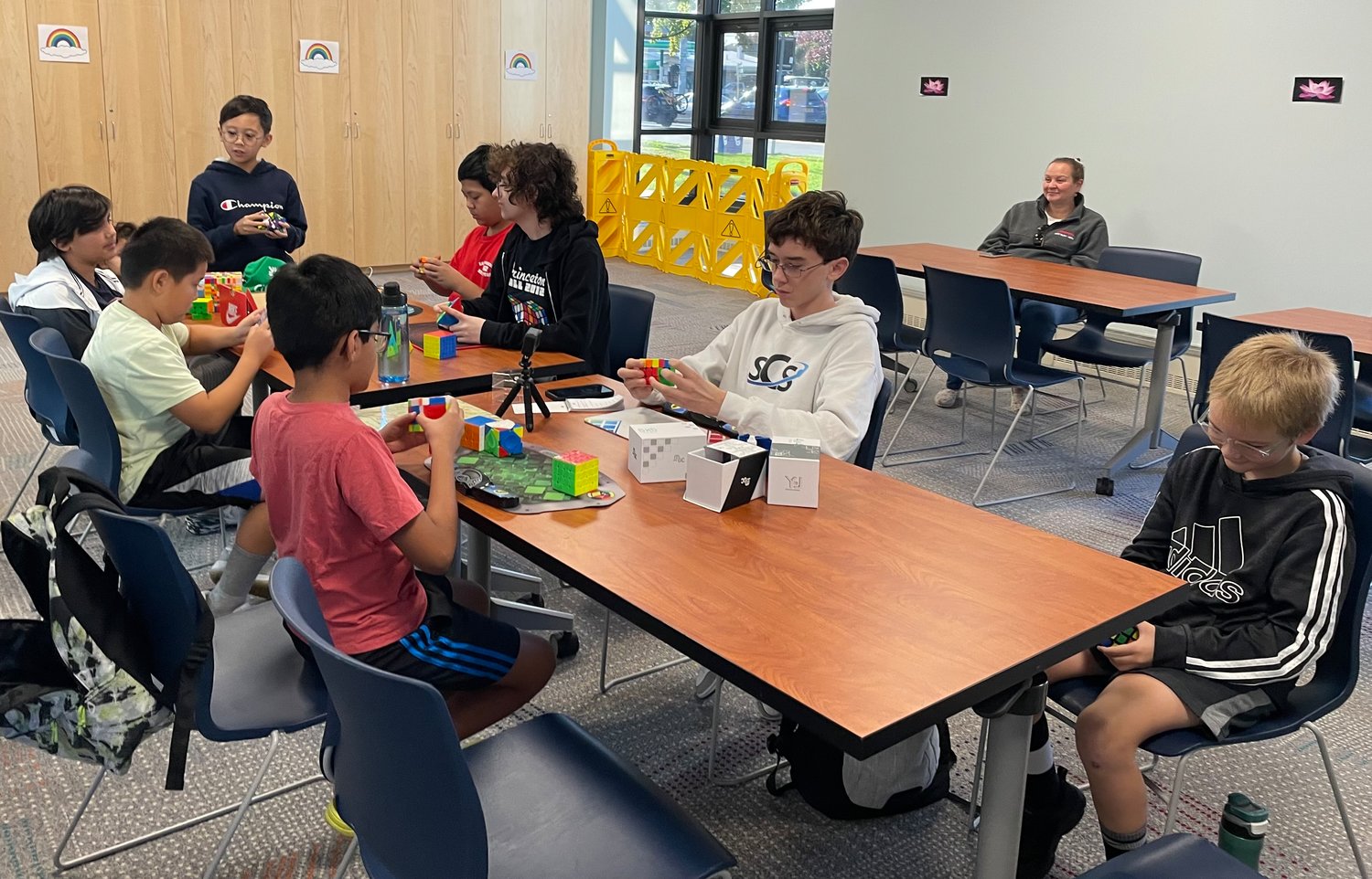 As Angelo got more into speedcubing, Faye thought that starting a club would be a cool idea. From there, two workshops were created to teach other kids how to speed cube.