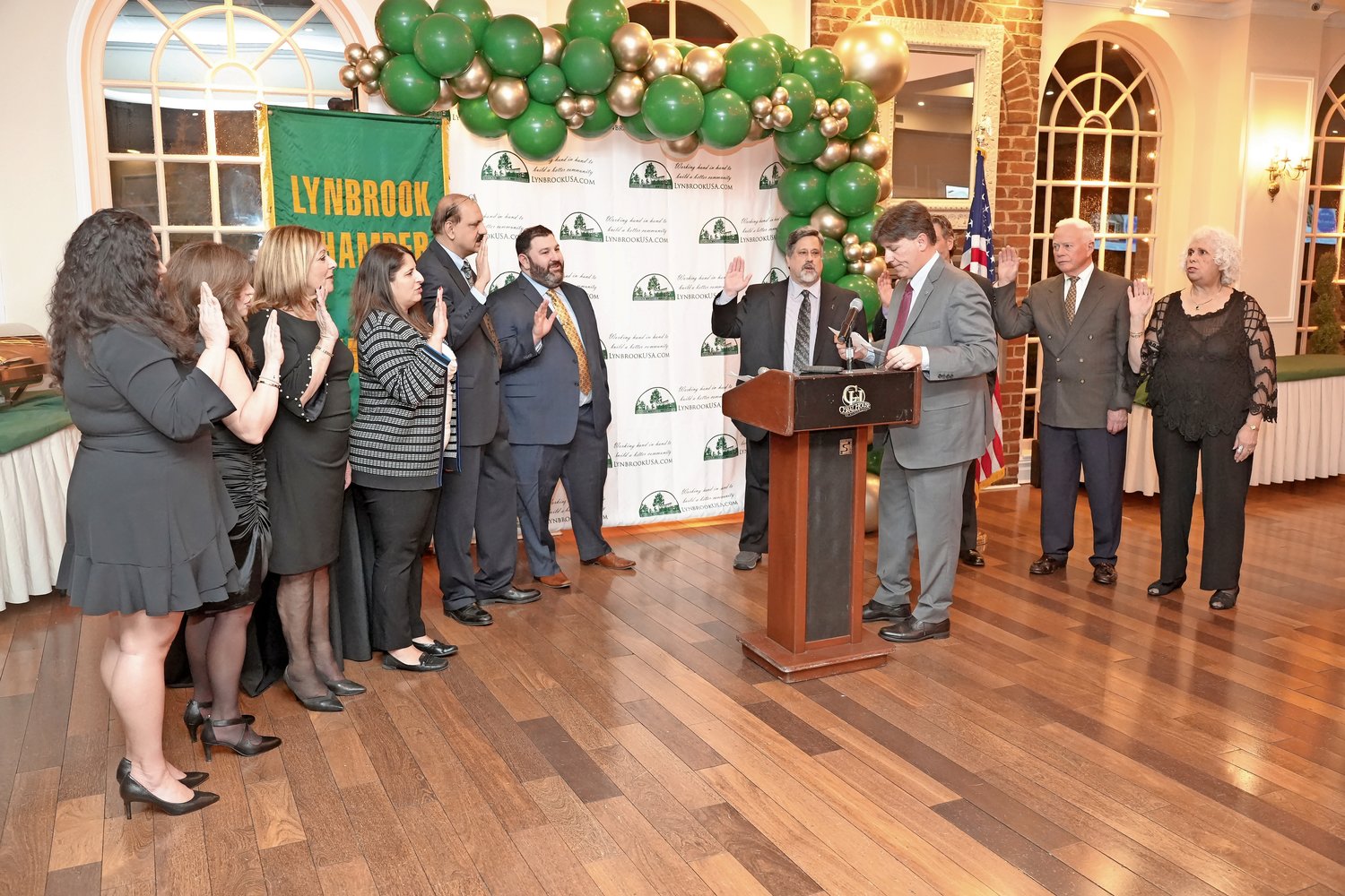 Board of Directors of the Lynbrook Chamber of Commerce AnnMarie Lubrano, left, Melissa Matassa, Rhonda Glickman, Denise Rogers, Shirish Mohile, Cory Hirsch, Steven Wangel being sworn in as executive director by Robert Boccio, Harold Reese and Eleanor Jogbaggy.