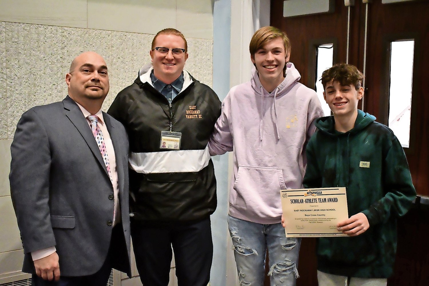 Members of East Rockaway Jr./Sr. High School boys’ soccer team were honored as a Scholar-Athlete team with Athletic Director Gary Gregory.