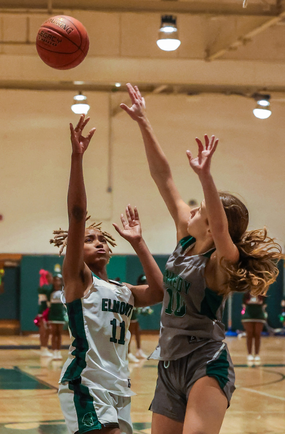 Taylah Farquharson, left, netted a game-high 14 points in Elmont's 42-32 win over Kennedy.