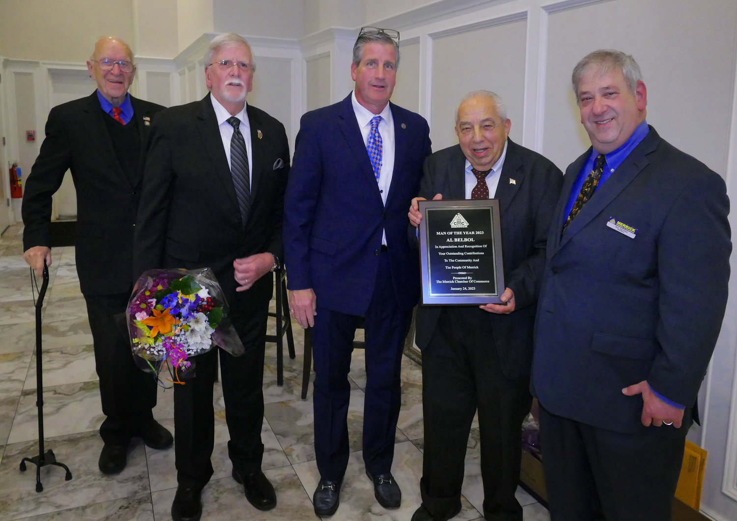 Assemblyman Dave McDonough, chamber board members Joe Baker and Douglas Mills, and chamber president Ira Reiter honored Man of the Year, Al Belbol.