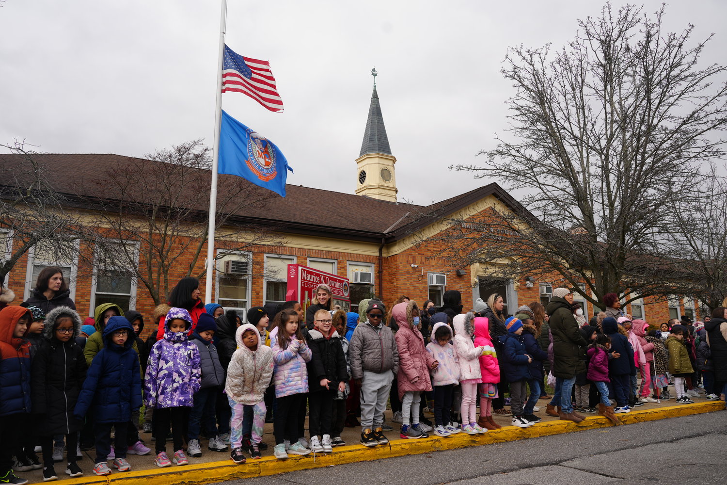 Maurice W. Downing Elementary School students gathered to bear witness to the street renaming.