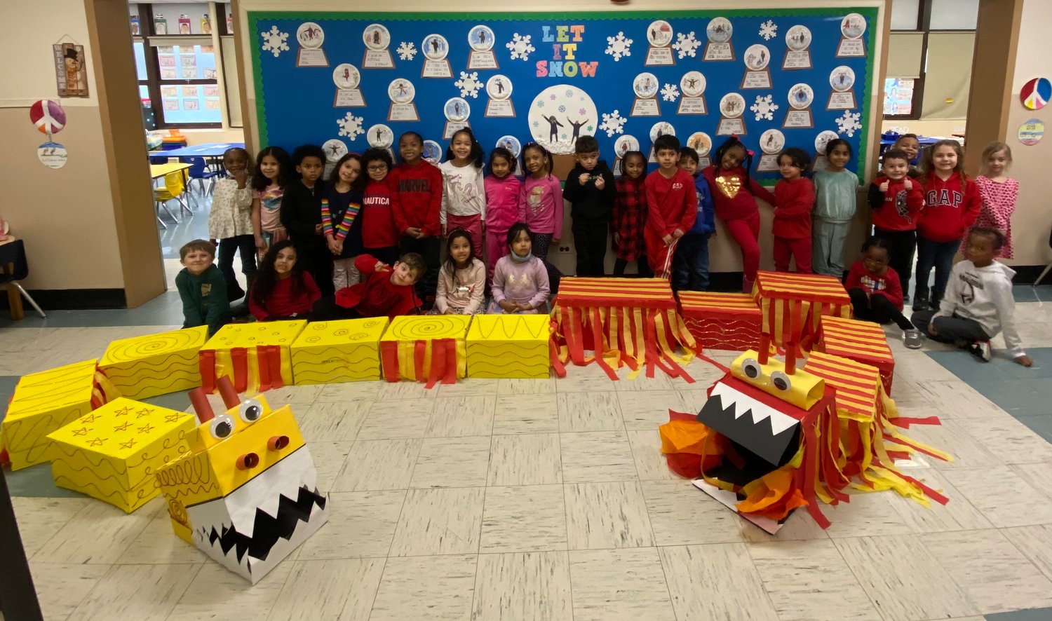 William L. Buck Elementary School students watch their finished moveable dragon to celebrate the Lunar New Year.