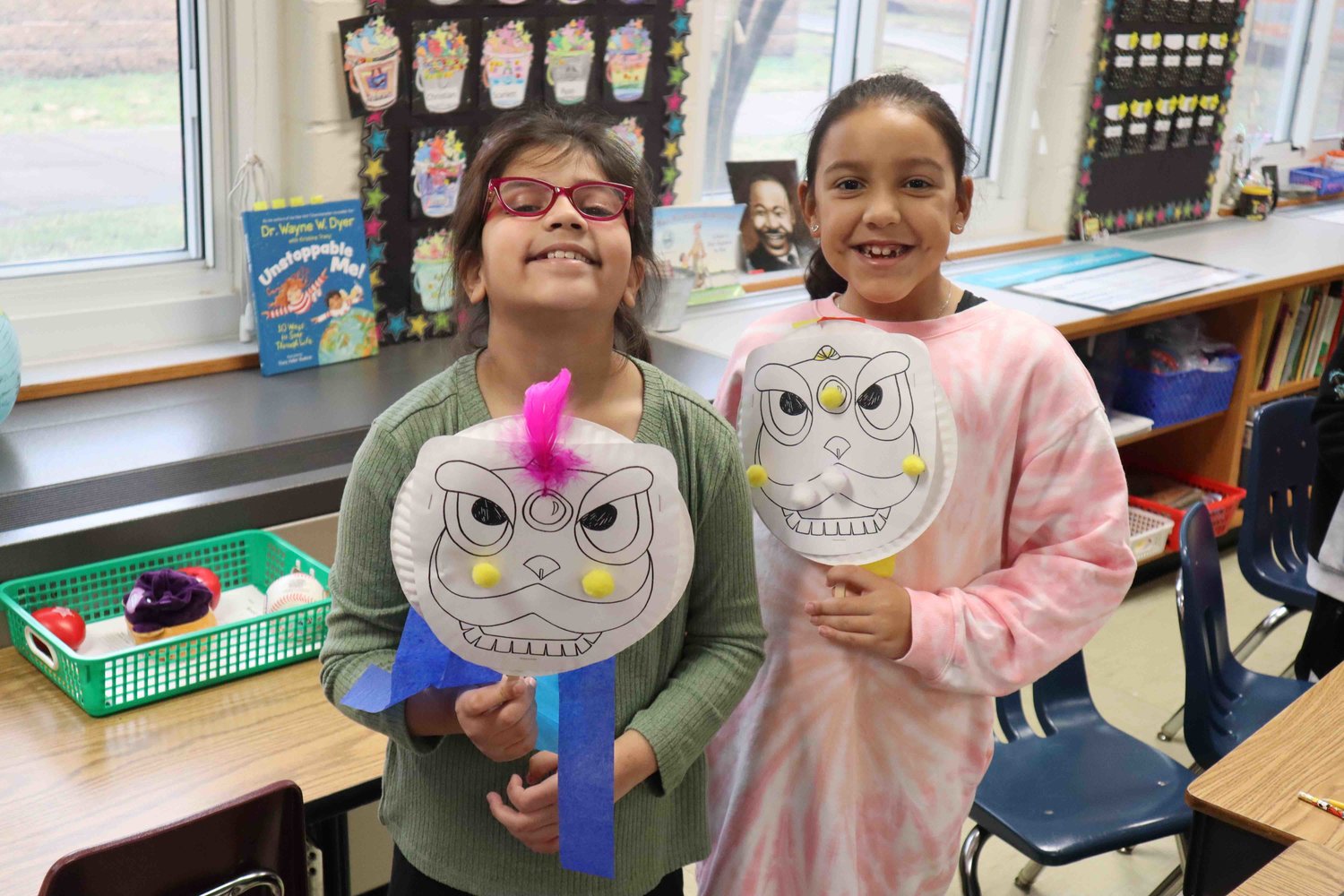 From left, Anniyah Adeel and Gabriella Ospina Caicedo celebrated the Lunar New Year at Shaw Avenue Elementary School.