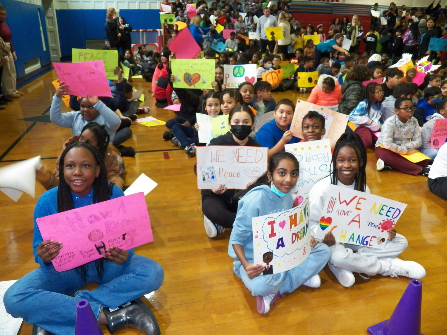 Gotham Avenue School held its first Dr. Martin Luther King Jr. Peace March on Jan. 13. Students gathered in the school’s gymnasium, sporting signs promoting peace and unity.