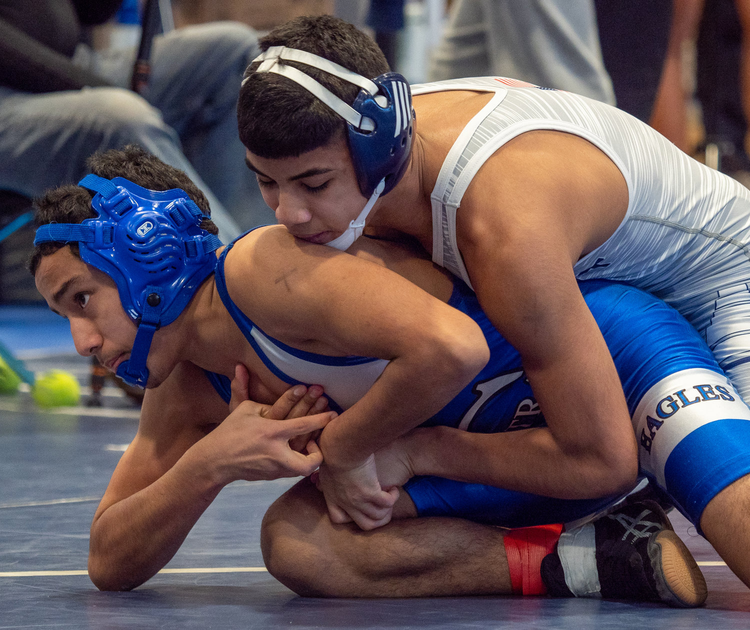 Eighth-grader Carlos Salazar, top, captured the 110-pound qualifier title last Saturday and was one of six champions for the Bulldogs.