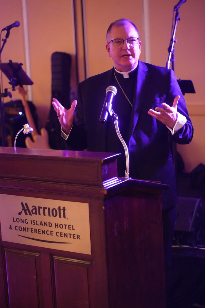 Bishop John O. Barres gives the closing remarks during the St. Agnes Cathedral School Dinner Dance event.
