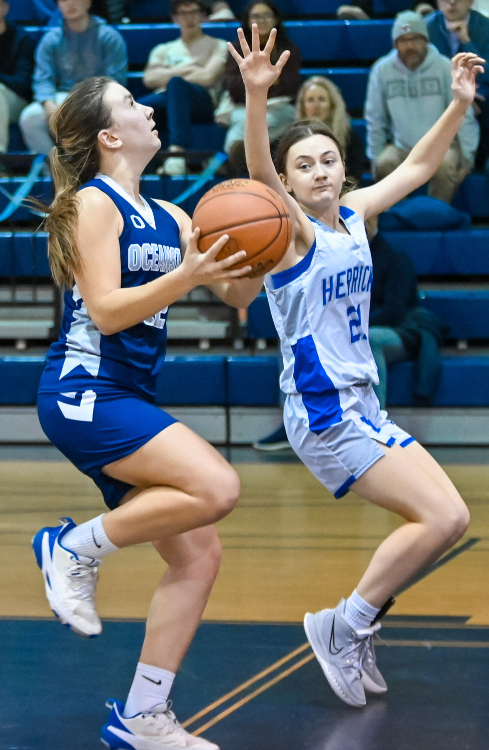 Junior Samantha Farsky, left, had 11 points in Oceanside’s playoff-clinching victory over Herricks on Feb. 9.