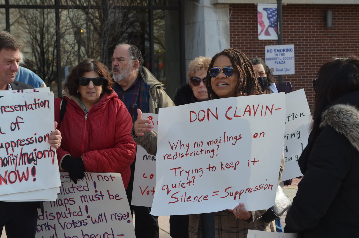 Mimi Pierre-Johnson, right, was one of dozens of community members who rallied outside Hempstead Town Hall in a last-ditch effort to protest the latest redistricting map proposal by the Town Board. Critics say the map violates the state’s Municipal Home Rule Law, the Voting Rights Act of 1965 and New York’s John R. Lewis Voting Rights Act. If approved, it could lead to a costly litigation, at taxpayers’ expense.