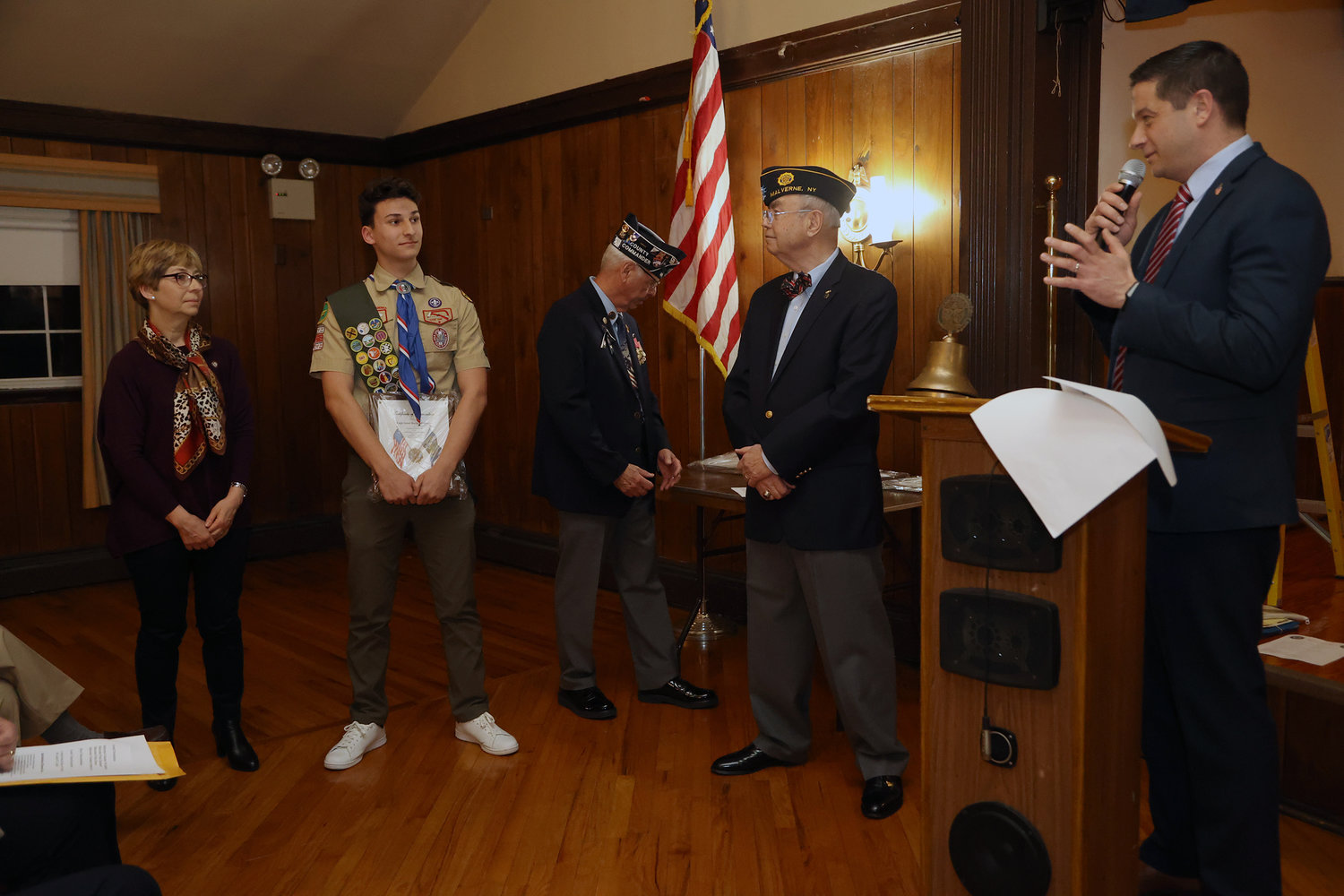 Trustee Carl Prizzi presents the Boys State Award to Eagle Scout Raymond Cerere.