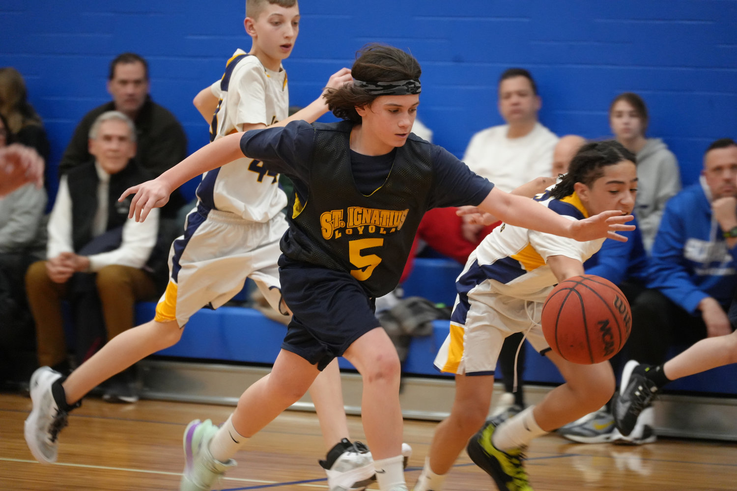 Seventh-grader Austin Wolff, from St. Ignatius Loyola, in Hicksville, moved the ball against St. Joseph’s, of Ronkonkoma, last Saturday at the 15th annual Winter Classic basketball tournament at St. Raphael’s.