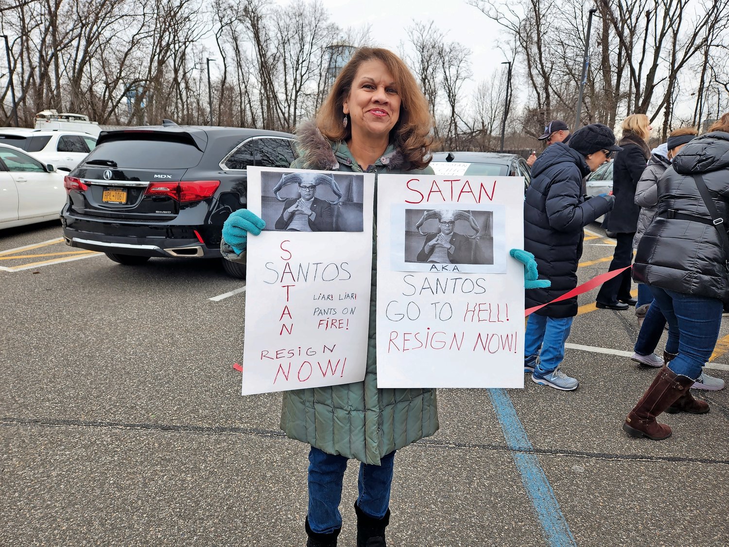 Dulce Urena, a Glen Head resident and daughter of immigrant parents, said Santos is a disgrace to American democracy.