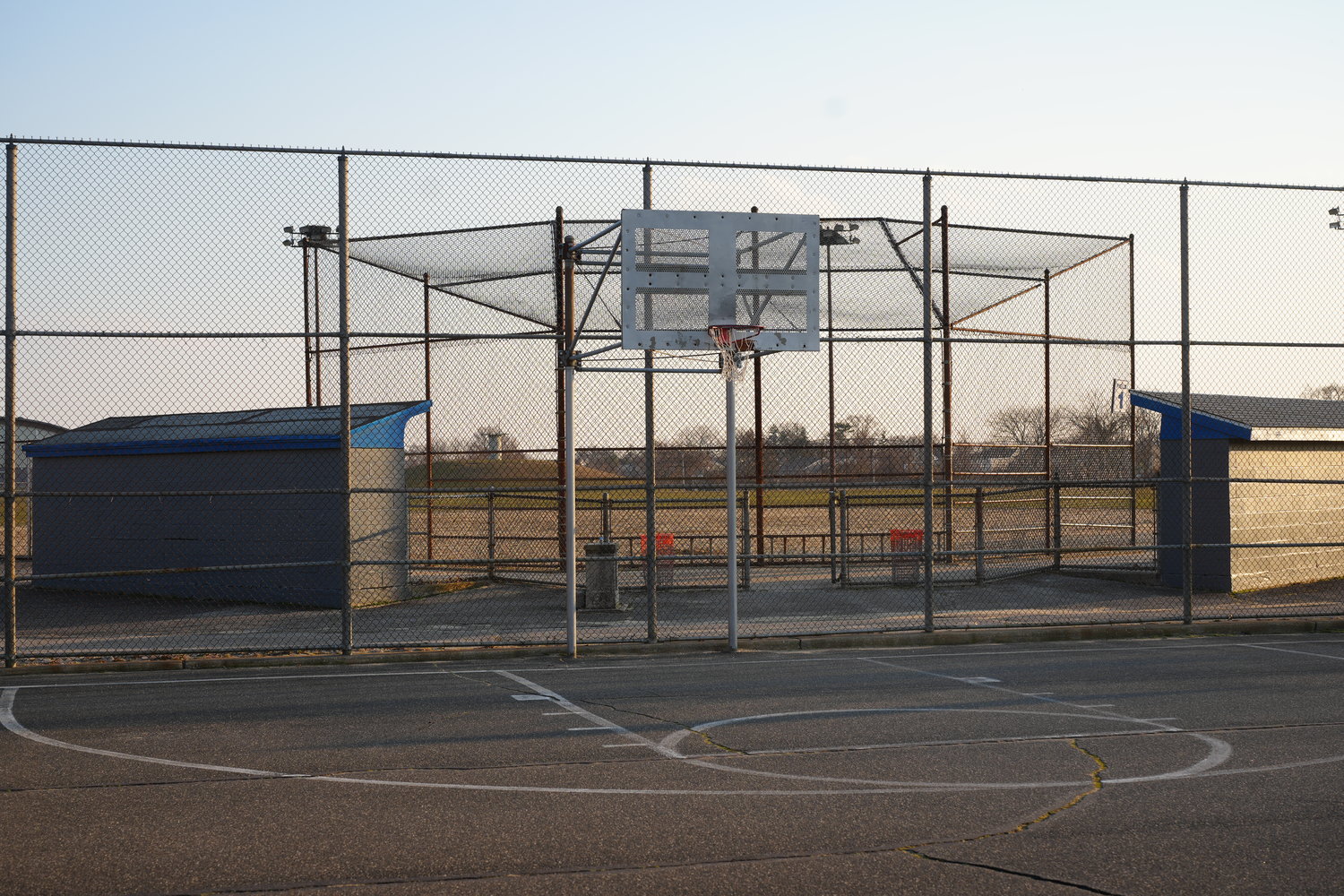 The basketball courts, above, will be redone. The fencing around the courts will be upgraded.