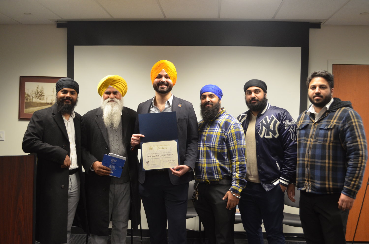 Gurpreet Singh, far left, Daler Singh, Japneet Singh, Chitinderpal Singh, Gurjot Singh and Harmanpreet Singh are leaders in the Sikh community of Richmond Hill, Queens, who participated in the South Asian Town Hall at Elmont Memorial Public Library. One of their organizations, the Khalsa Community Patrol, strives to make the neighborhood safer for those impacted by the rise in hate crimes in the area.