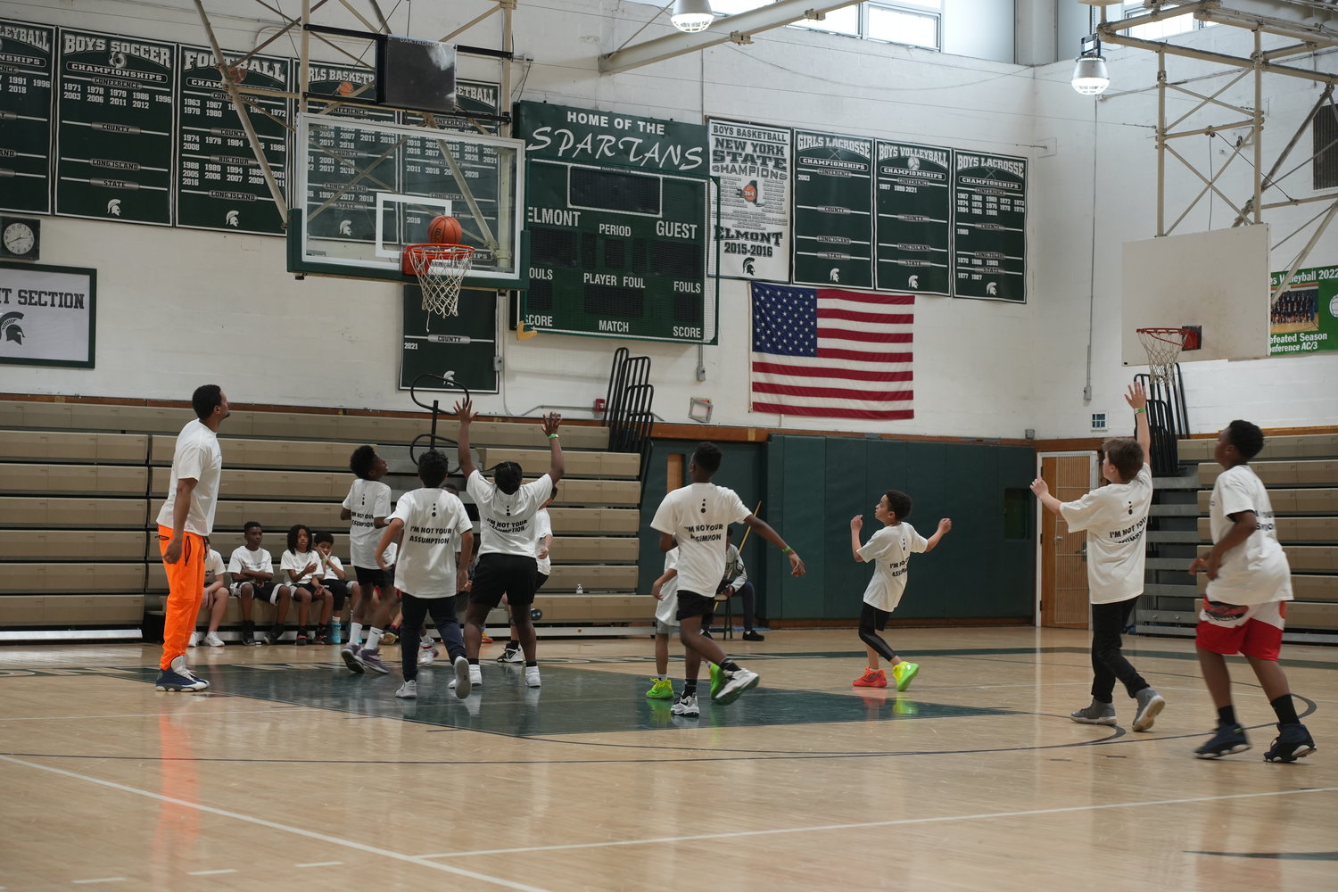 The young players took part in some friendly competition on the Elmont High School Spartan basketball court.