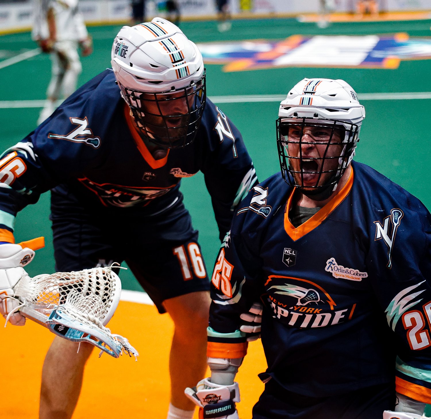 The Riptide's Scott Dominey, right, celebrated his fourth-quarter goal with Jack Kelly on Saturday as New York defeated Philadelphia, 13-10.