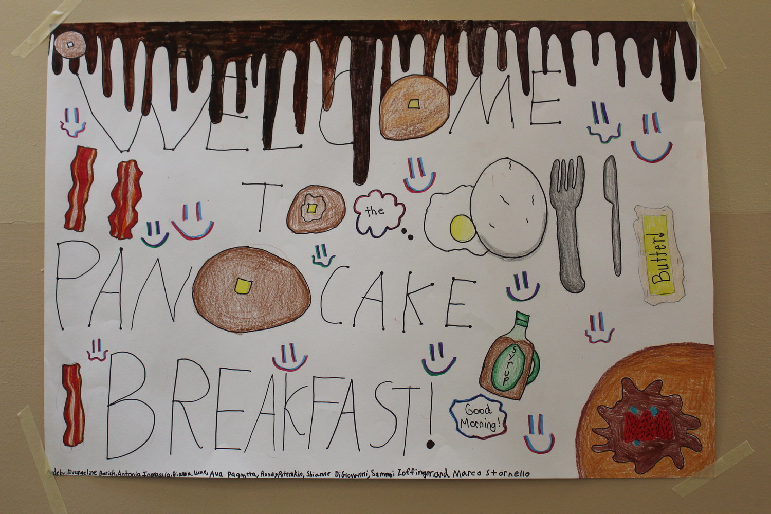 Kiwanis kids made signs to greet hungry locals headed to the St. Anthony's cafeteria.