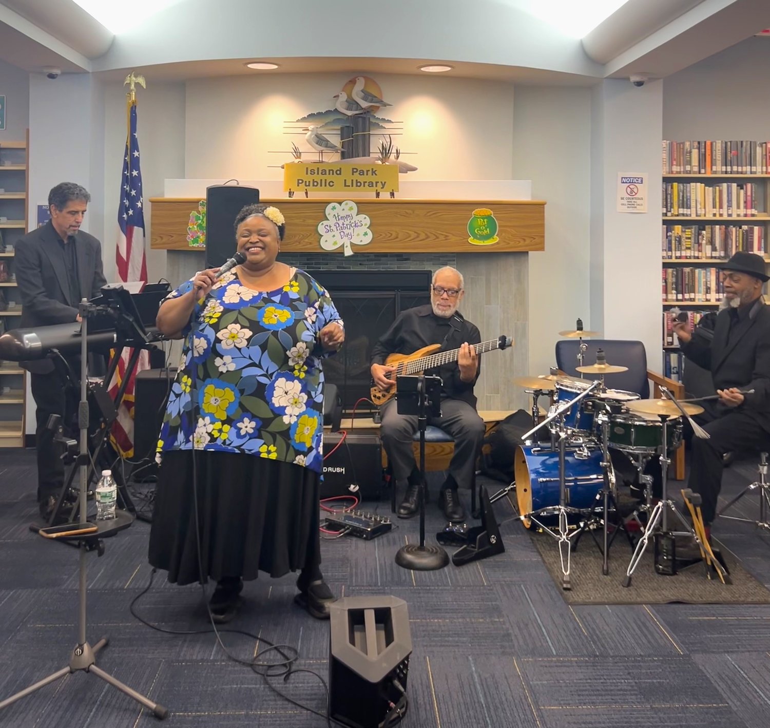 Rhonda Denét and the Silver Fox Trio — Chuck Batton on drums, Gene Torres on bass and Michael Bardash on keys performing at the Island Park Public Library on March 11. Their song selection honored the women    singers who came before them.
