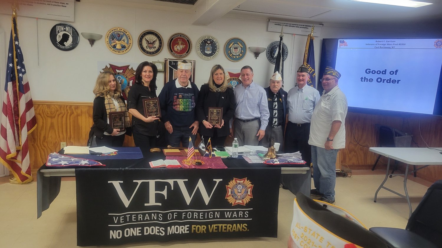 Michele Wachter, left, with Denise Walsh, Post 3350 Commander Joe McCarthy, Maureen Early, Assemblyman Brian Curran, Quartermaster Patrick Iuliucci, 2nd Vice Commander Ed Cook, and Chaplin Frank Colón.