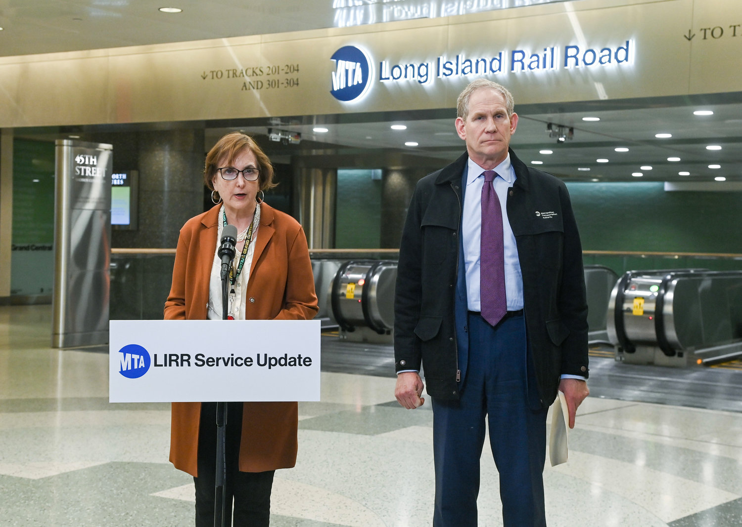 Long Island Rail Road interim President Catherine Rinaldi and Metropolitan Transportation Authority Chief Executive Janno Lieber are re-routing four Grand Central Madison trains back to Penn Station after higher-than-expected ridership on the West Side.