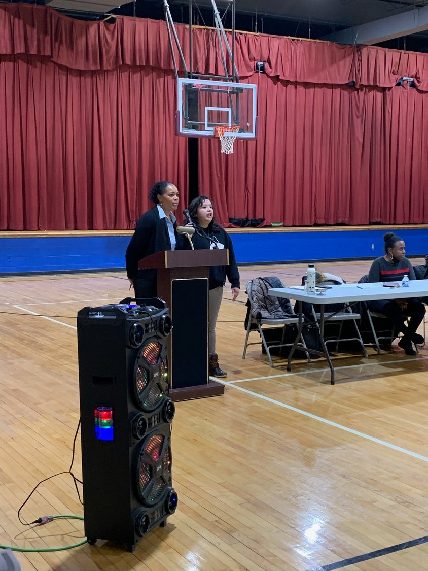 Five Towns Community Center board president, Gwynn Campbell, addressed neighbors with questions and concerns on the two proposals submitted to Nassau County.