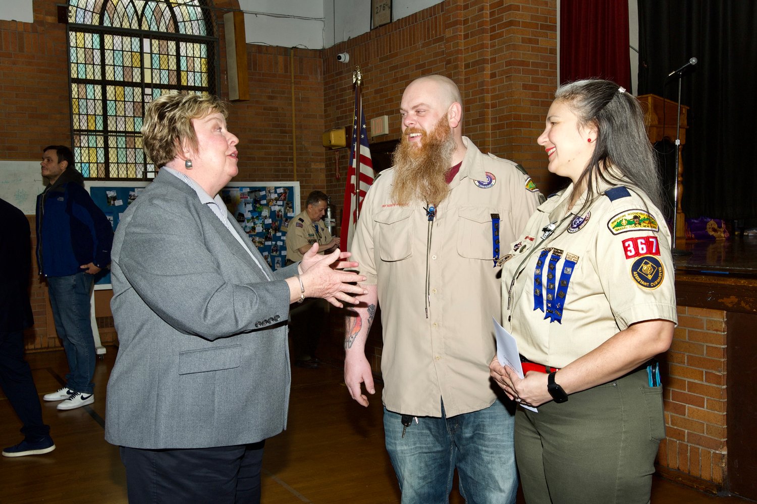 Town Councilwoman Kate Murray with scout members John Soto and Mildred Molina.
