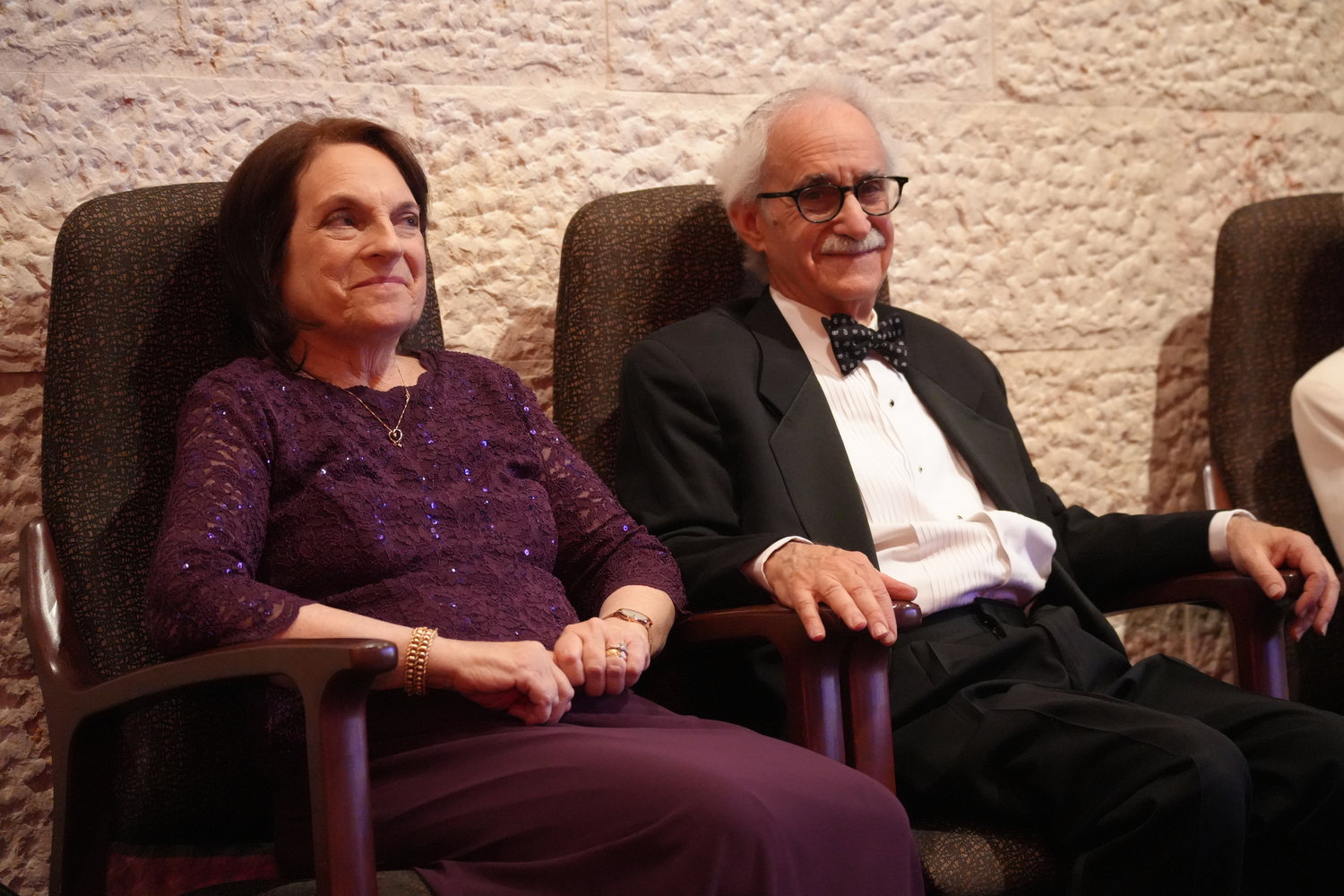 Rabbi Androphy, right, sat with his wife, Nancy, during the speech portion of his retirement gala.