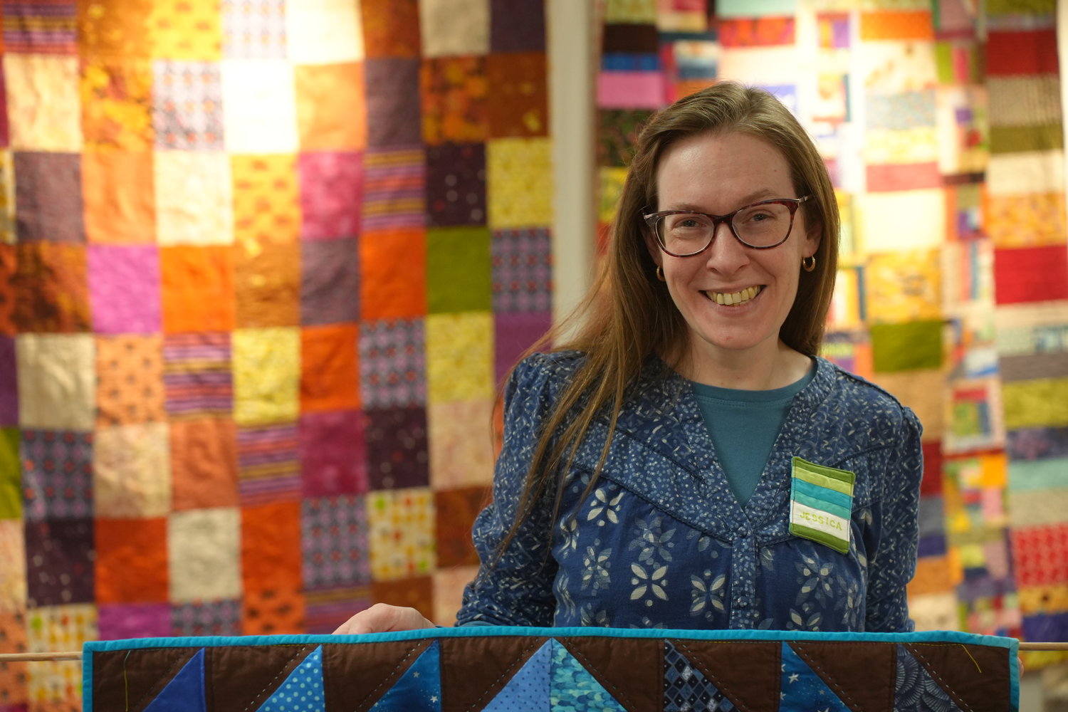 Jessica Alexandrakis, an accomplished quilter, had an opening ceremony for her show on exhibit at the Bellmore Memorial Library earlier this month.