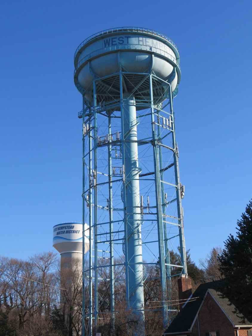 The old water tower, which is currently being dismantled, was replaced in 2019 by the new water tower in the background.
