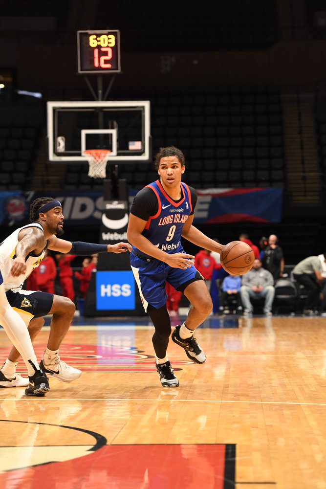 Long Island Nets' Dru Smith, right, had 14 points in the loss to Fort Wayne.