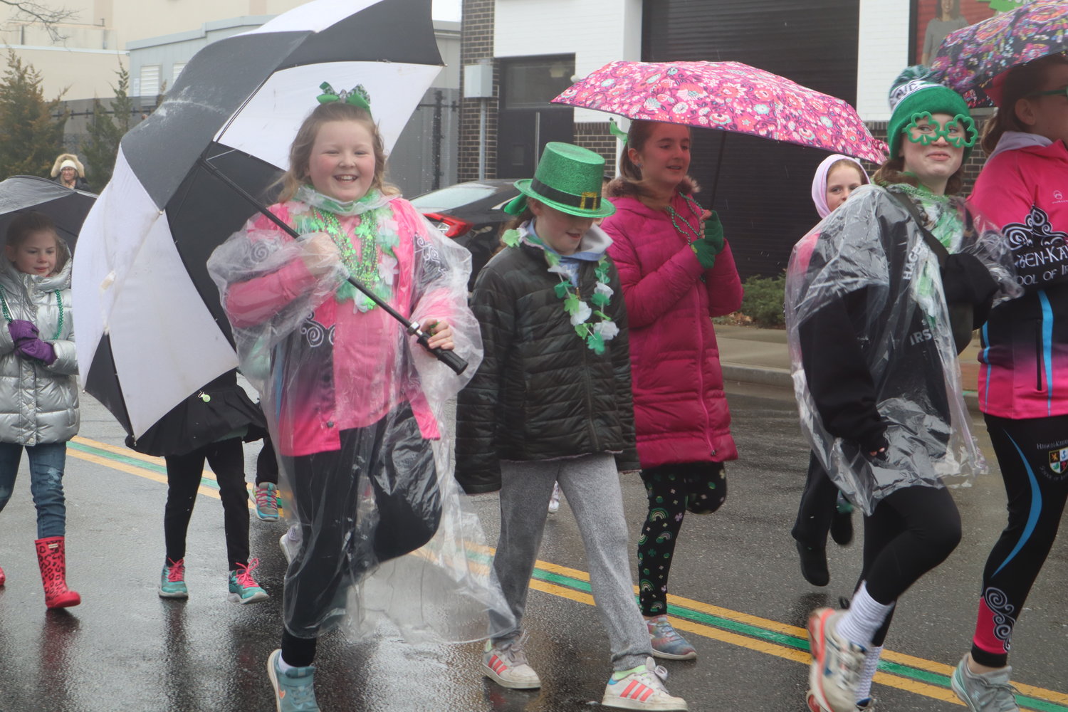 The weather couldn’t keep Michaela Stines down, as she joyfully performed with the Hagen-Kavanagh School of Irish Dance during the 25th annual Rockville Centre St. Patrick’s Day Parade.