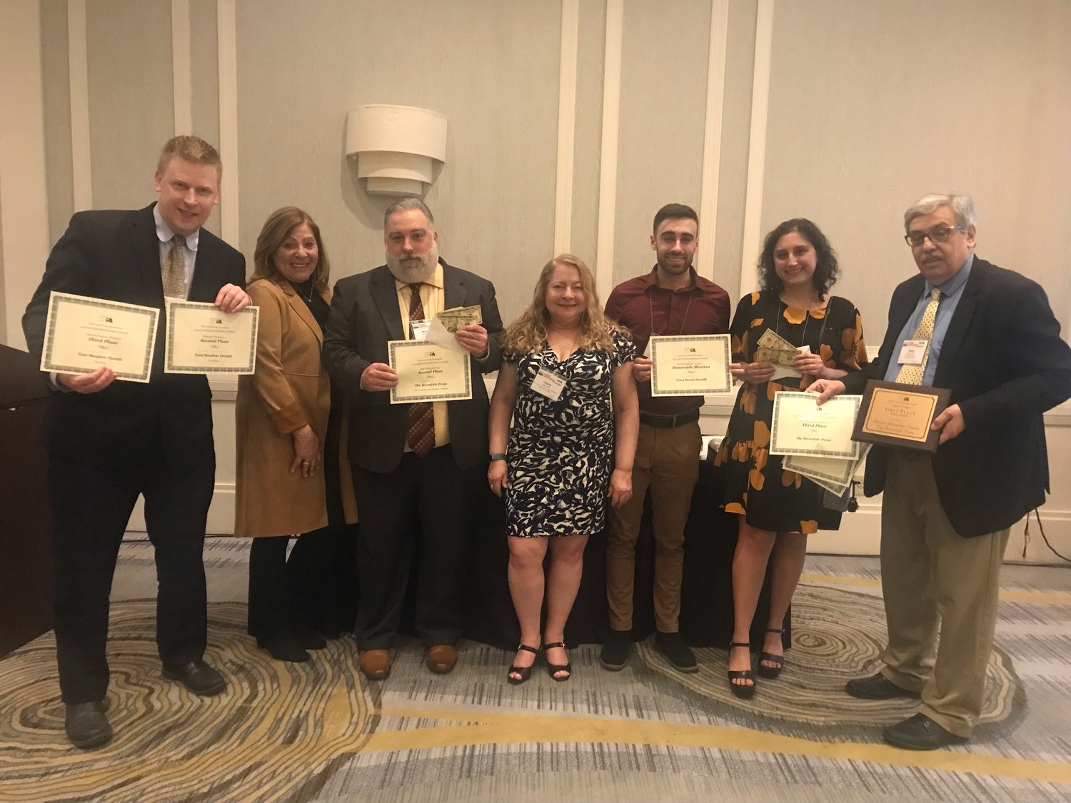 Some of the winners who were in Albany for this weekend's New York Press Association Better Newspaper Contest awards include, from left, photo editor Tim Baker, sales vice president Rhonda Glickman, executive editor Michael Hinman, senior editor Laura Lane, senior reporter Brendan Carpenter, senior reporter Ana Borruto and Riverdale Press editor Gary Larkin.