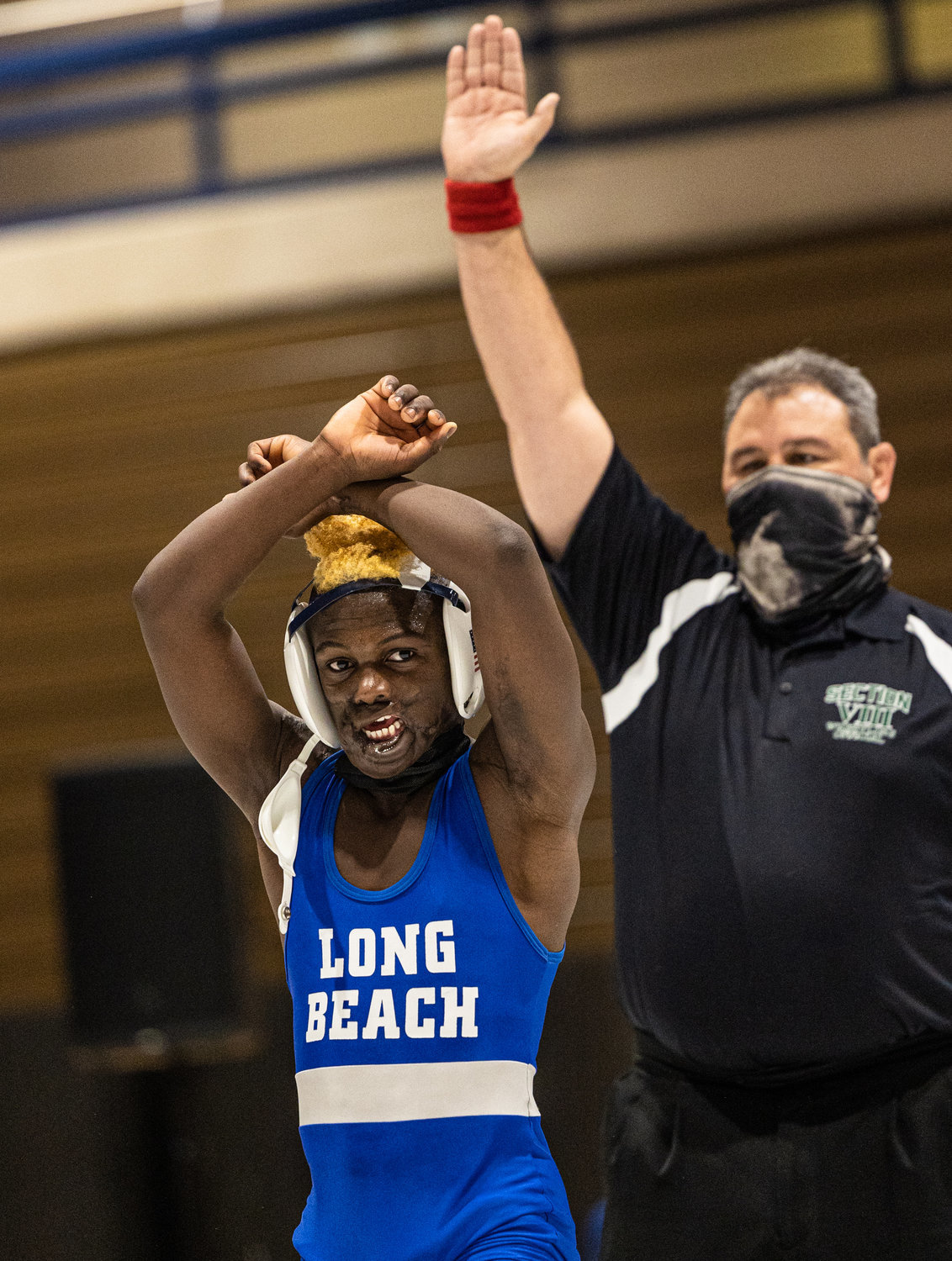 Long Beach eighth-grader Dunia Sibomana captured the Nassau County Division ! wrestling championship in the 102-pound weight class. The story on Sibomana's journey earned sports editor Tony Bellissimo a top state award from the New York Press Association.