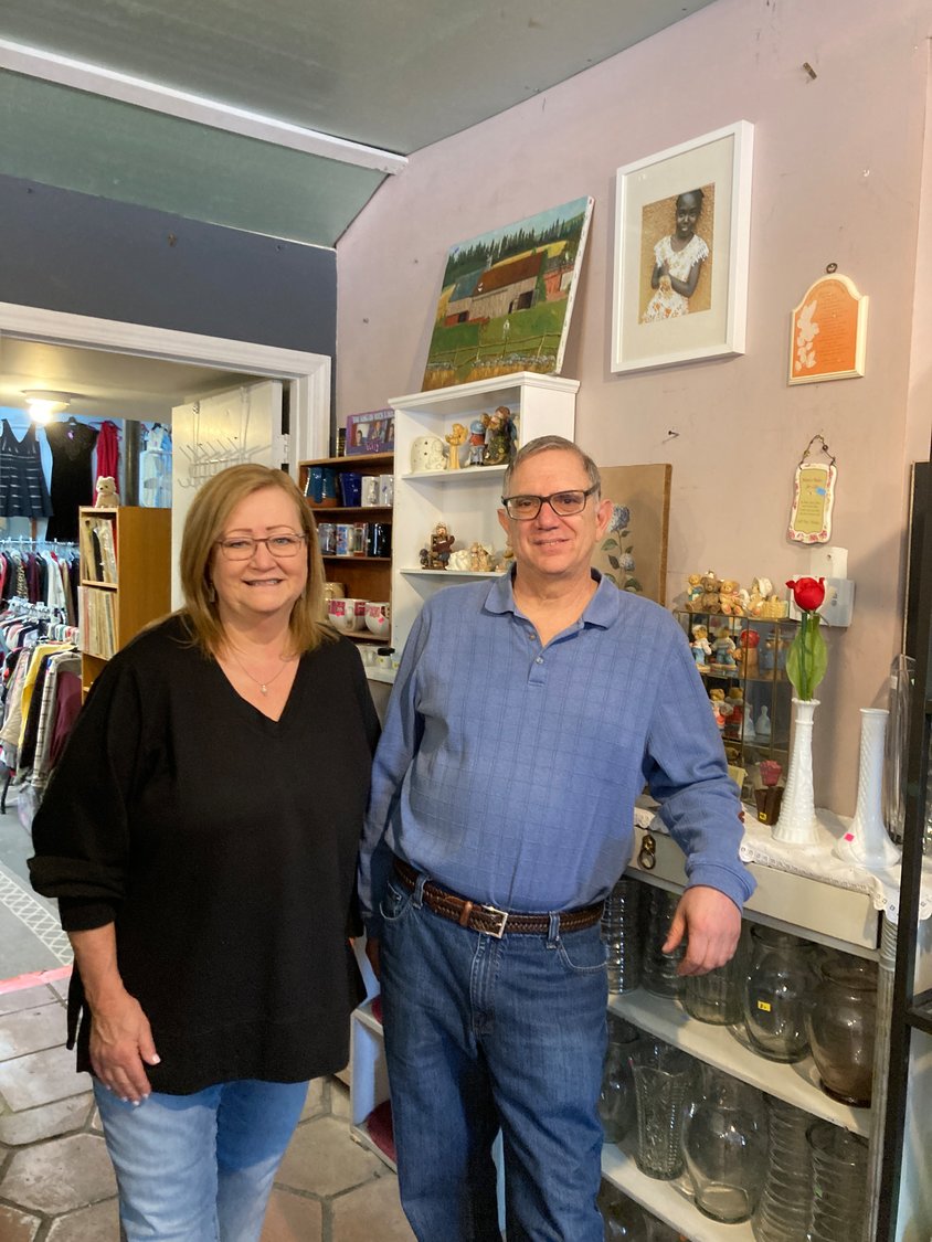 Volunteer Barbara Groff takes pride in her work organizing the clothing and other items for sale at the Hope for Long Island Thrift Store. Manager Joe Scibelli complimented her, and all of the volunteers.