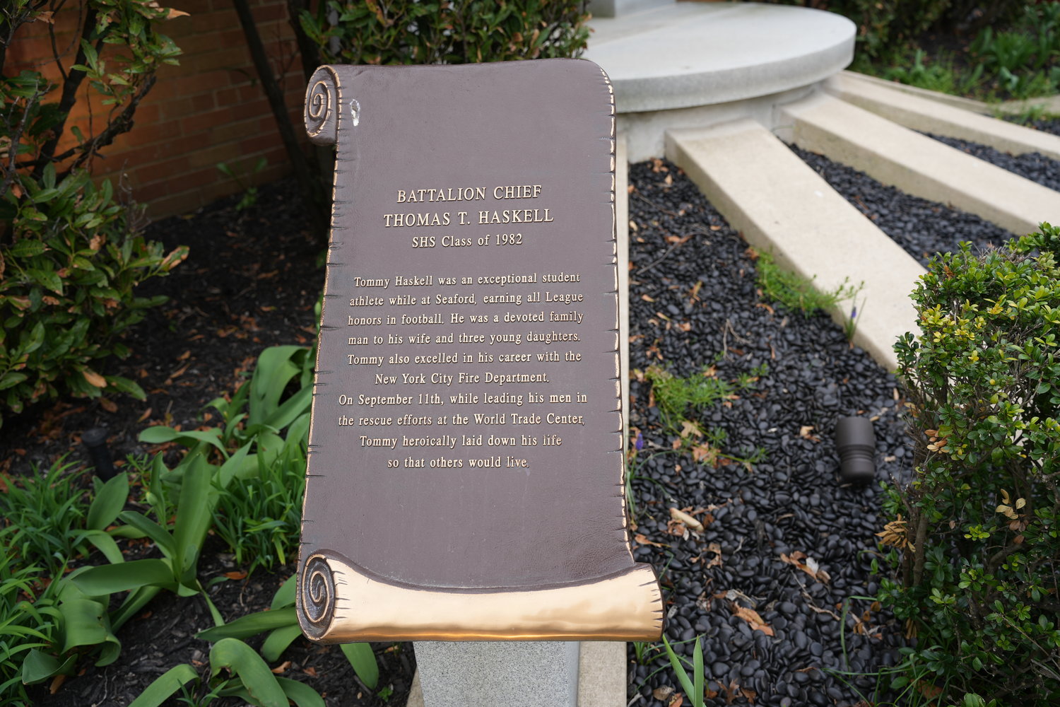 The memorial, which Joe Mottola helped create, is at Seaford High School. It features remembrances of all five alumni the school lost on 9/11.