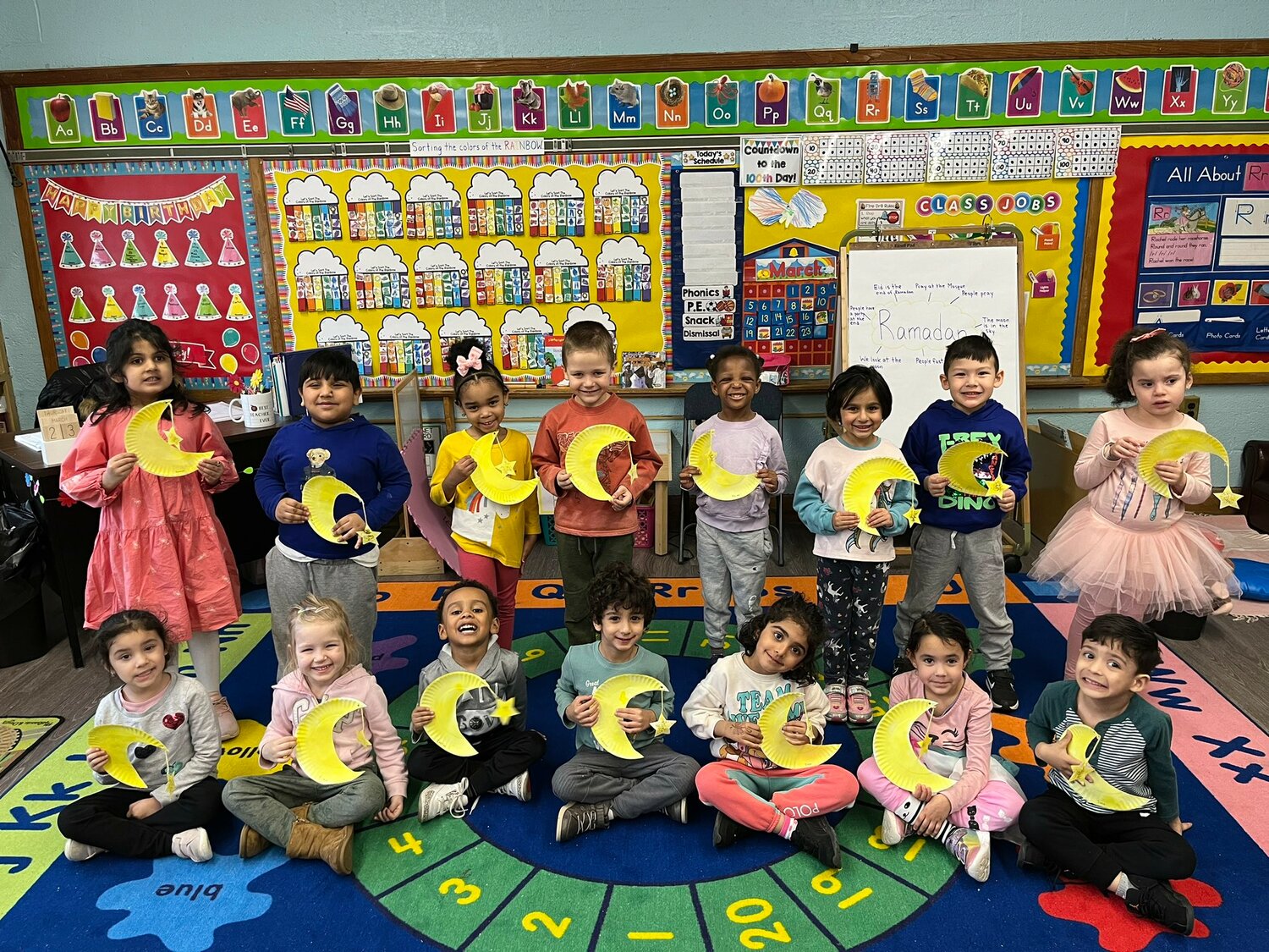 Howell Road Elementary School students with their crescent moon and stars in honor of Ramadan.