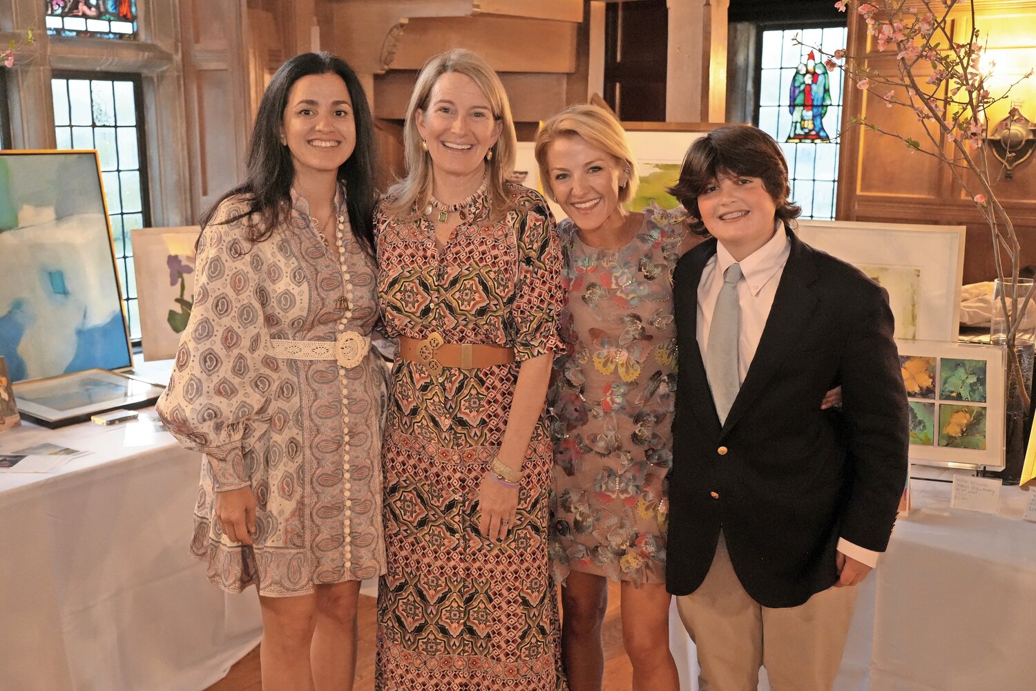 Christina Potter, far left, artist Anne Neilson, Kate Doerge and her son, Frankie Doerge, at Angels & Art For a Cause on April 19 at St. John’s in Lattingtown. The fundraiser supported Penny’s Flight, a foundation that raises awareness of neurofibromatosis, and helps fund research into a cure.