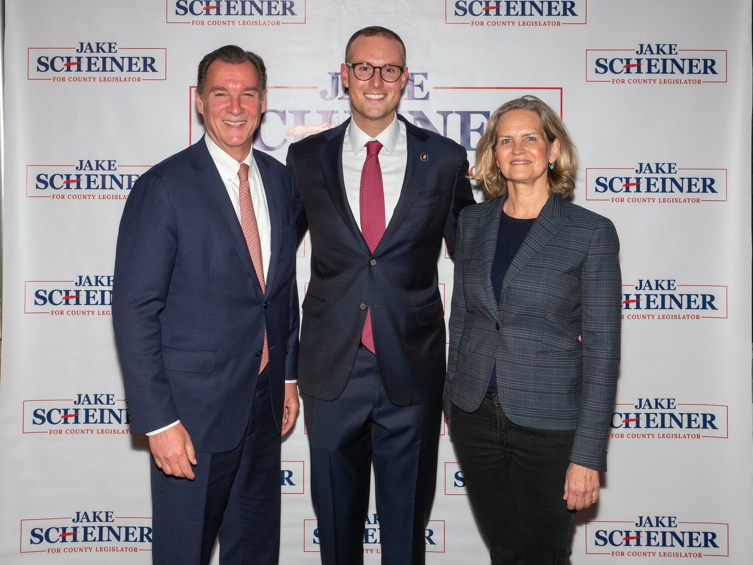 Scheiner has been endorsed by former Nassau County Executives Thomas Suozzi, left, and Laura Curran.