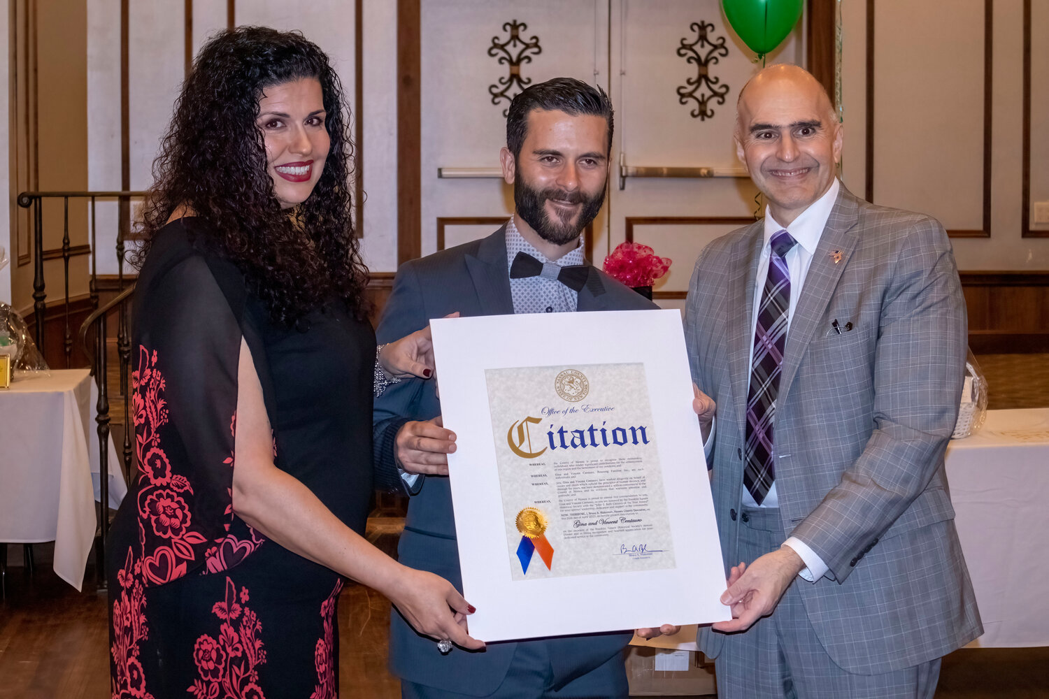 Gina, left, and Vincent Centauro of Rescuing Families, Inc received the 2023 Citizens of the Year award from Nassau County Legislator John Giuffre.