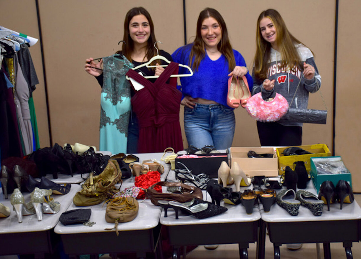 Jordyn Kratenstein; Ava Mogelefsky, chapter    president of Becca’s Closet; and Julie Lehrfeld worked   together to collect over 300 prom dresses for students in need.